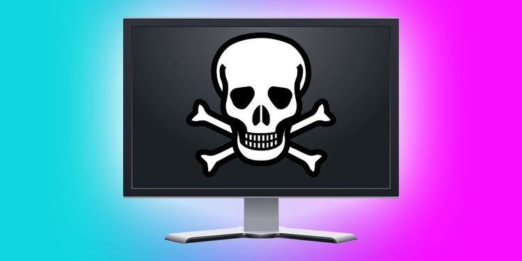 monitor over gradiant background with skull on screen