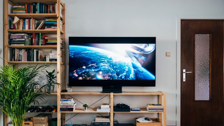 television in living room with outer space1