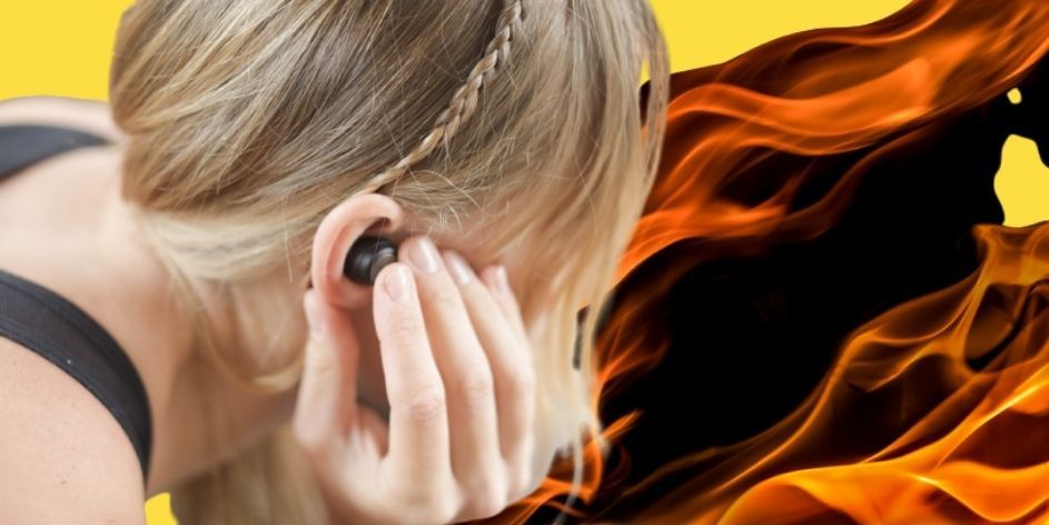 woman wearing earbuds on fire